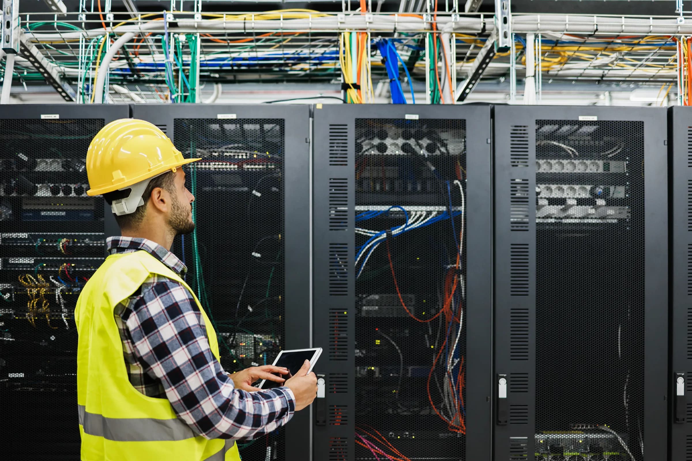 Commissioning agent reviewing controls integration on a data center jobsite